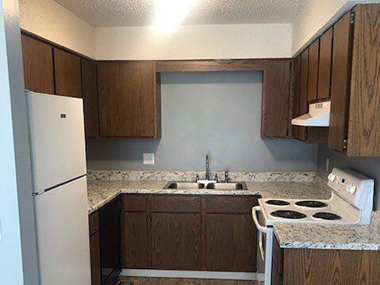 apartment kitchen with cabinets